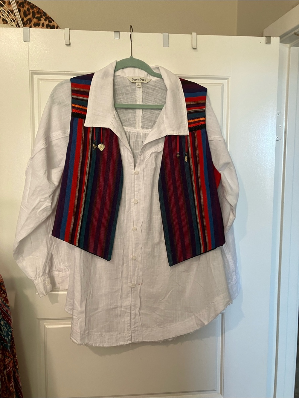 The Crazy Frog Multicolor Striped Vest with charms styled with a fitted shirt